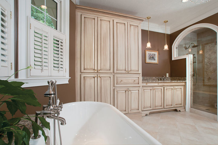 master bath remodel, bathroom ideas, home decor, This is the view when soaking in the double slipper tub There is an abundance of storage cabinetry for linens the television and a built in safe In the middle is the coffee bar with its own sink and pendant lighting