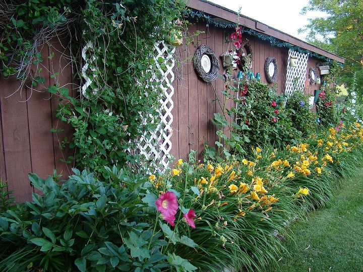 gardening, gardening, outdoor living, Honeysuckle and clematis line the garden cottage as well as peonies and lilies