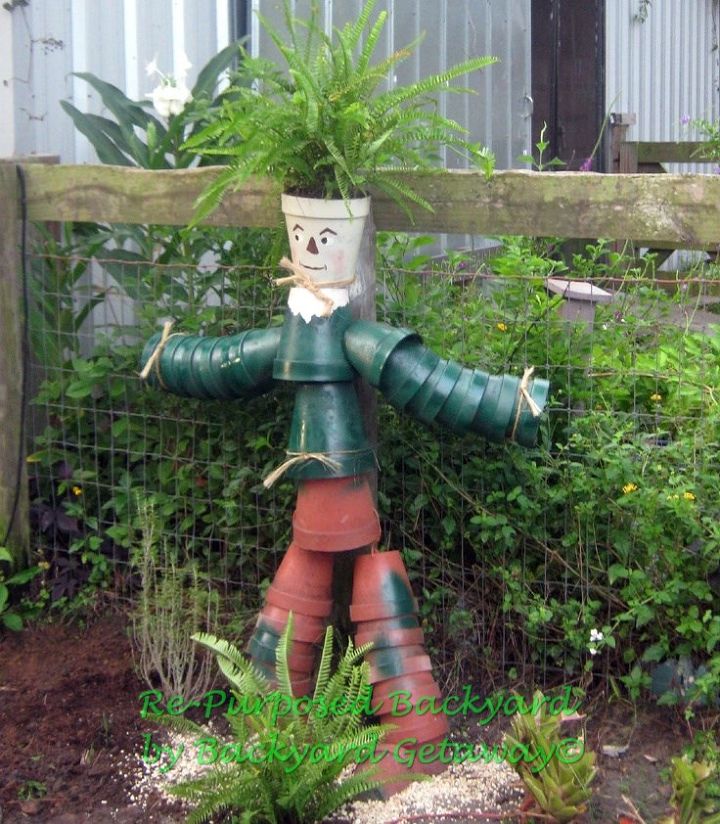 re purposed backyard, gardening, repurposing upcycling, Rubber pot scarecrow