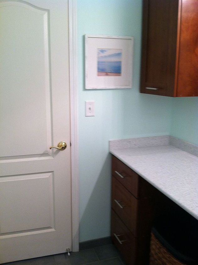 spare bathroom remodel under 4 000, bathroom ideas, home decor, home improvement, Hallway door with cabinets on the right