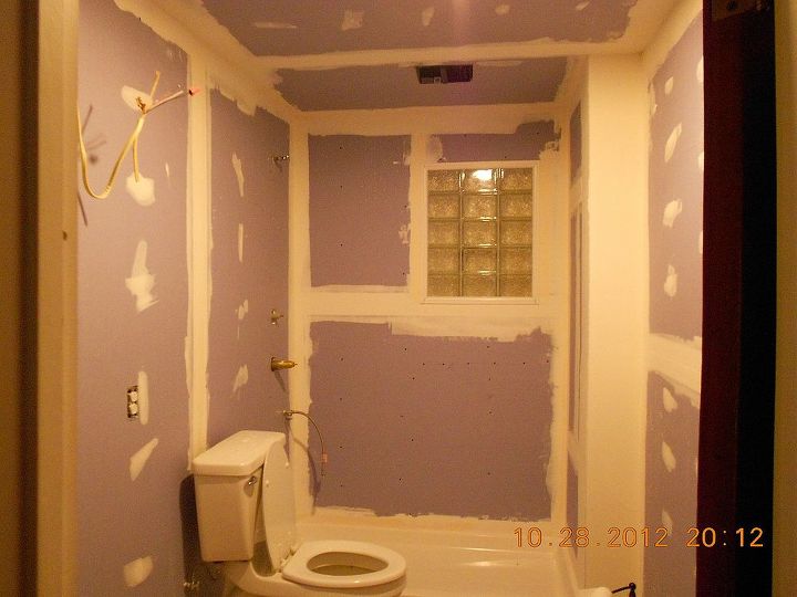 a puny 50 s bath remodel, bathroom ideas, home improvement, Down to the studs Moved into the bedroom closet on left hans side and moved shower to end outside wall