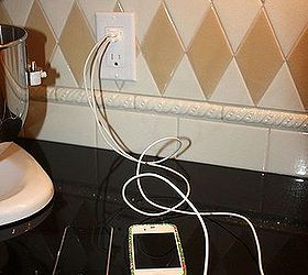 how to add a usb port to a wall outlet, electrical, Two phones charging in very little space