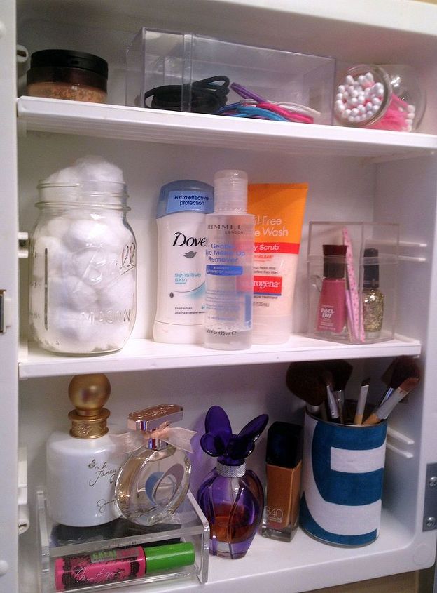 medicine cabinet organization how to tips and tricks, kitchen cabinets, organizing, Organize your medicine cabinet with cheap thrift finds and item found in the kitchen This is the cabinet after being organized