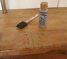 industrial console table tutorial, painted furniture, To give the table a little more industrial flare I stenciled on some numbers using gray paint After the paint was dry I went over the numbers with sand paper to age them