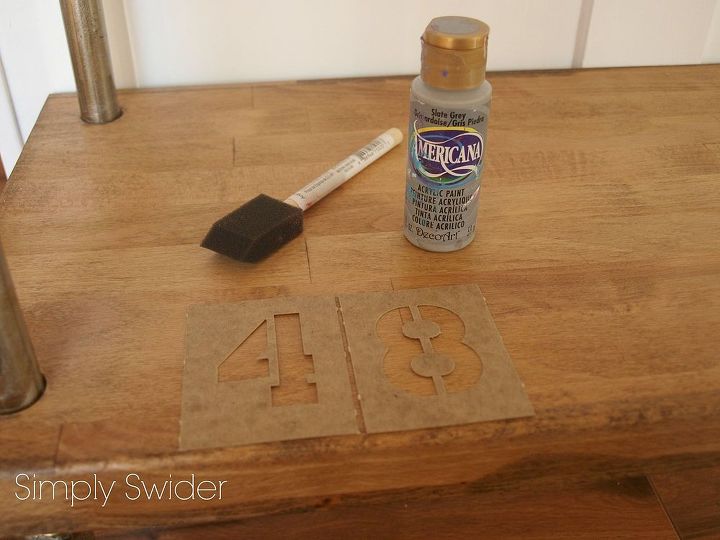 industrial console table tutorial, painted furniture, To give the table a little more industrial flare I stenciled on some numbers using gray paint After the paint was dry I went over the numbers with sand paper to age them