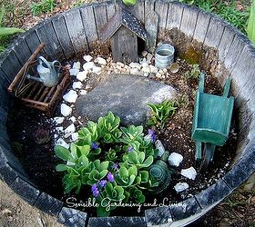 charmed gardens a collection of fairy miniature garden making tips, container gardening, crafts, gardening, terrarium, A barrel is perfect for a fairy garden This one is by Sensible Gardening Living at