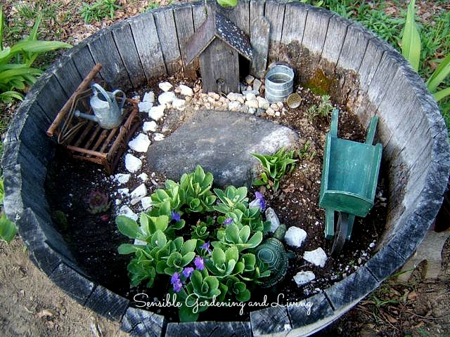charmed gardens a collection of fairy miniature garden making tips, container gardening, crafts, gardening, terrarium, A barrel is perfect for a fairy garden This one is by Sensible Gardening Living at