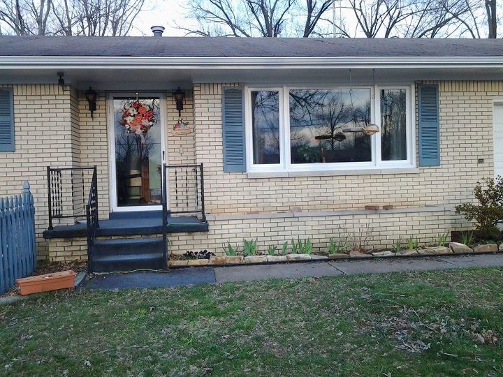 porch on a brick ranch, front of brick ranch with planter box