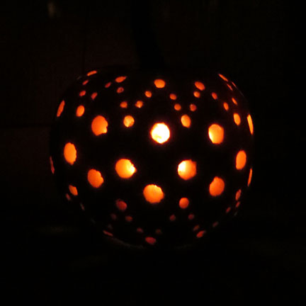pretty pumpkins for thanksgiving flair, halloween decorations, seasonal holiday d cor, thanksgiving decorations, Use drill bits to create a chic pumpkin luminary