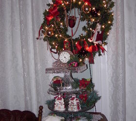 i love decorating our 1895 queen anne victorian for christmas with 12 trees, christmas decorations, seasonal holiday decor, wreaths, One of many wreaths with lights