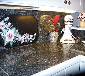 my 1940 s inspired kitchen renovation, home improvement, kitchen design, The countertops are Blue Pearl Granite TILES saved thousands over slab granite The tray was an old grey metal one my talented sister painted for me Note the modern KitchenAid next to hand crank egg beater in crock