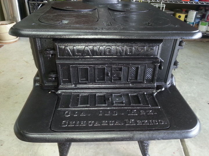 how to restore an old cast iron wood burning stove, I used several coats of vegetable oil and some summer sun to get the sheen