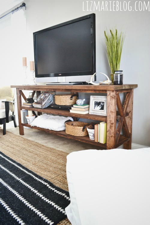 diy rustic tv console, electrical, home decor, painted furniture, rustic furniture, The TV stand is long works great in open floor plans or large living areas You can style this piece many different ways but we went for a cozy eclectic look feel