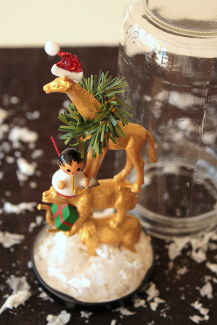 holiday animal snow globe, christmas decorations, seasonal holiday decor, Stack the animals using a hot glue gun