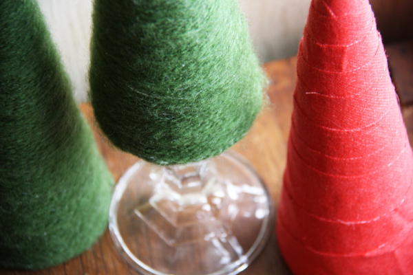 diy christmas tree cones, crafts, seasonal holiday decor, I like displaying my Christmas tree cones on candlestick stands to alternate the height