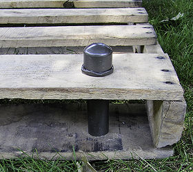 industrial look pallet coffee table, diy renovations projects, pallet projects, repurposing upcycling, check out my nut MAde with a PVC cap and caulk Then shaped to look like a nut and spray painted