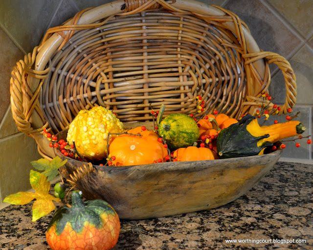 fall vignettes in the kitchen, seasonal holiday decor, A doughbowl overflowing with Fall goodies