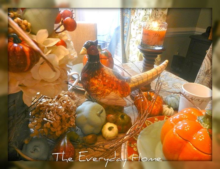 decorating a blue breakfast room for fall, seasonal holiday decor, Beautiful pheasants anchor each side of the floral arrangement