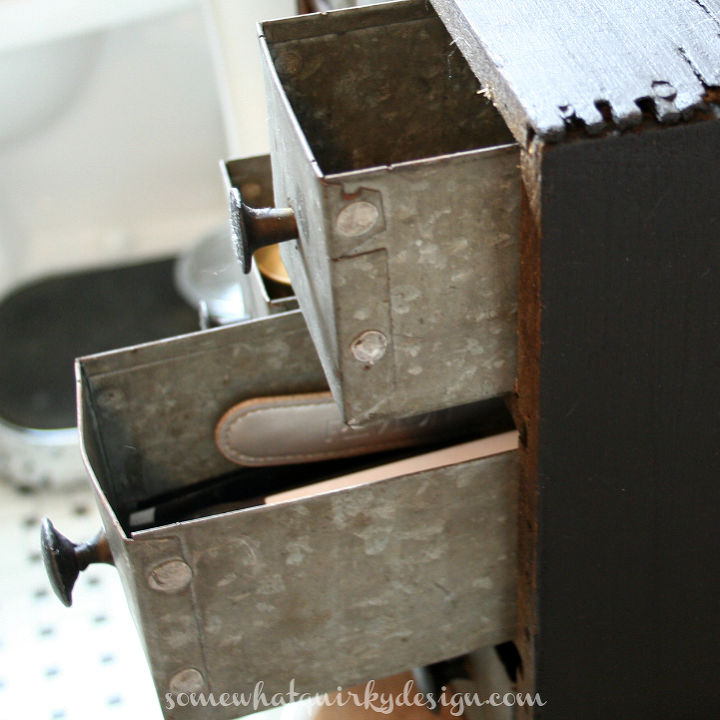 i repurposed this little storage cubby to use in my bathroom, bathroom ideas, repurposing upcycling, storage ideas, Every one of these drawers is handmade from scrap metal pieces So I m recycling the recycled