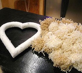 pom pom heart wreath, crafts, seasonal holiday decor, wreaths, I used two skeins of yarn One cream and one oatmeal and made pompoms the old fashioned way