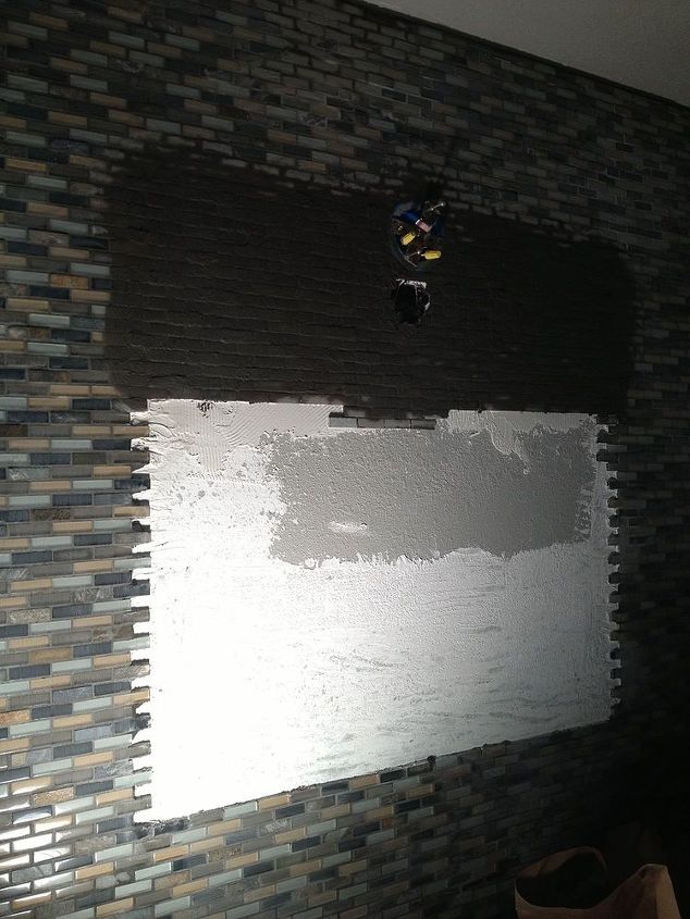 parede de mosaico, Deslocaliza o da caixa el trica para a lumin ria