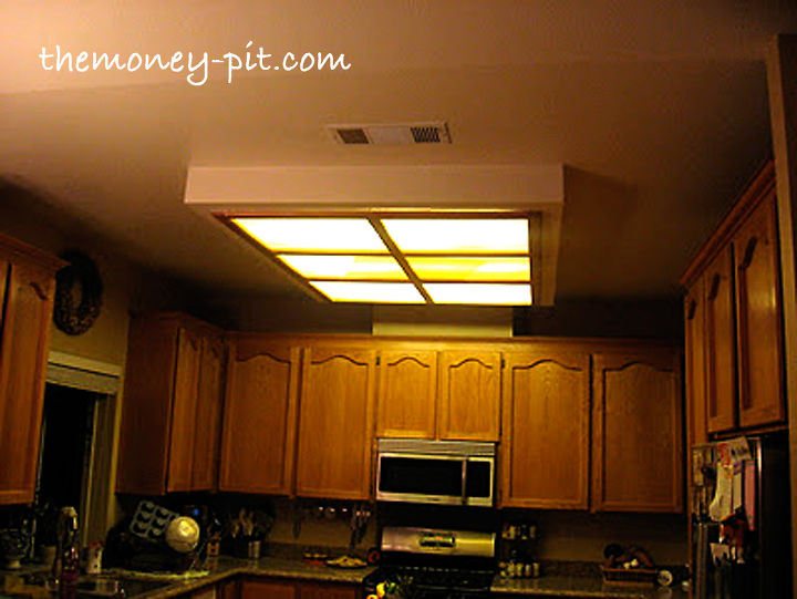 updating a fluorescent box light with led lighting and decorative molding, home decor, kitchen design, lighting, Before A four lamp fluorescent box fixture dominates the ceiling of the kitchen