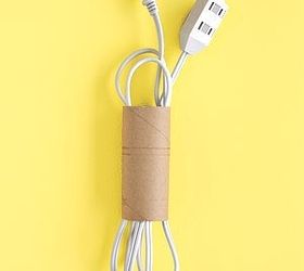 how to organize christmas once and for all, organizing, seasonal holiday decor, wreaths, Here s a bonus idea for storing extension cords using something I almost guarantee you have on hand a toilet paper roll Free and smart