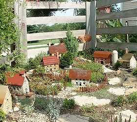 diana s fantastical miniature garden, crafts, gardening, repurposing upcycling, Diana s miniature garden in her mounded garden is weatherproof too