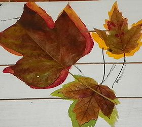 easy to make pallet yard art, crafts, pallet, seasonal holiday decor, I then Painted my Pallet a Neutral color in this case an Off White I traced the outline of the leaves onto the pallet and then painted the shapes I had traced