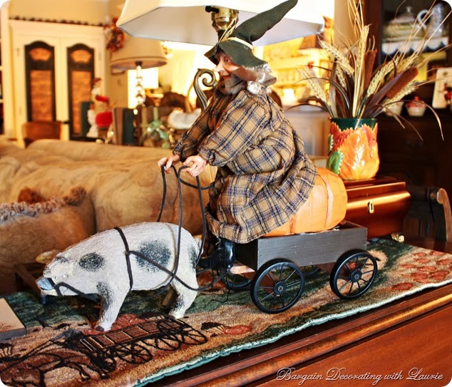 a few of the halloween decorations in our family room, halloween decorations, seasonal holiday d cor, I m not sure if this witch turned her horse into a hog or if the hog is her normal mode of transportation