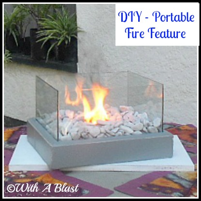 portable mini fire feature, diy, outdoor living, A few pieces of leftover planks some glass mesh wire a can and you end up with this lovely piece