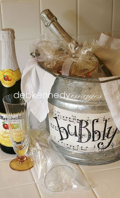 bubbly in a bucket, crafts, slip champagne glasses into clear cello gift bags and tie with ribbon then tuck them into a bucket filled with ice and a sparkling beverage