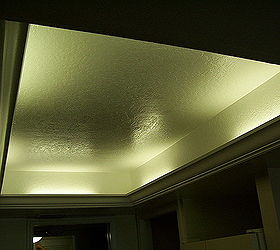 what to do with that 1980 s style kitchen lighting, Florescent or LED lights can be installed behind the crown molding for an elegant look