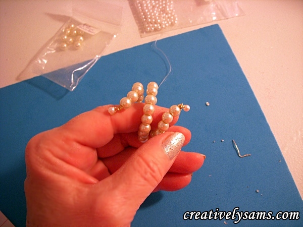 pearl napkin rings tutorial, crafts, Gentle pull out the ends away from the center You re done with the first napkin ring Repeat for as many as you need