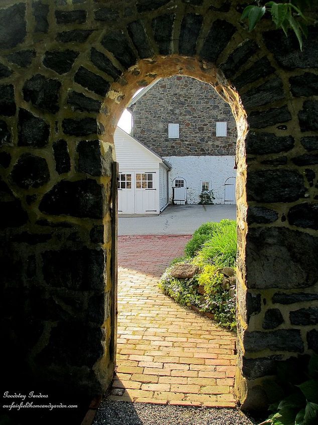 may garden historic goodstay gardens, gardening, entrance in the stone wall