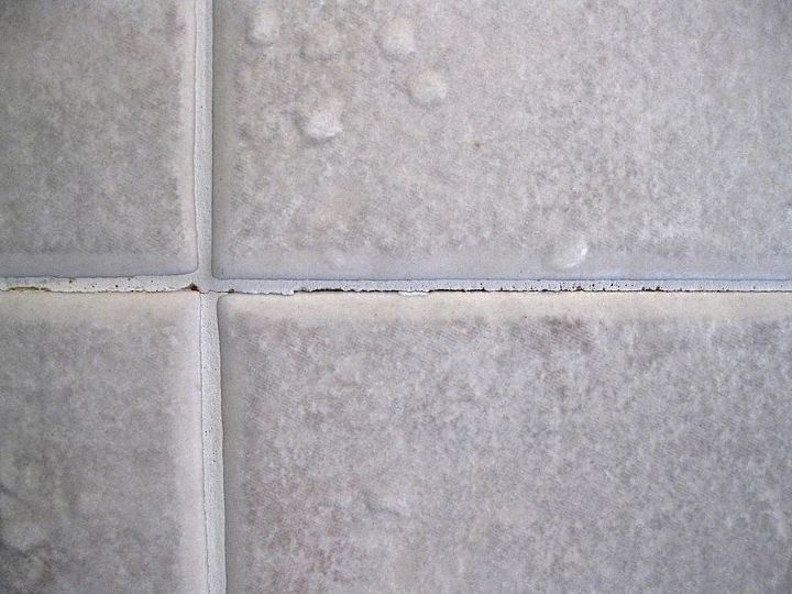 how do i repair cracked grout on shower walls