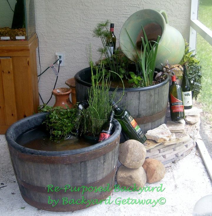 re purposed backyard, gardening, repurposing upcycling, whiskey barrel water feature