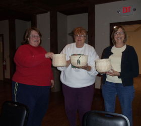 basket weaving class i took and basket i made 11 3 12, crafts, Look at the baskets girl in red and sweather their baskets are tall and thin they wrapped them very tight and decided on no trees mine is beginning of trees not done yet