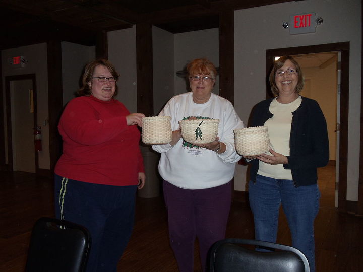 basket weaving class i took and basket i made 11 3 12, crafts, Look at the baskets girl in red and sweather their baskets are tall and thin they wrapped them very tight and decided on no trees mine is beginning of trees not done yet