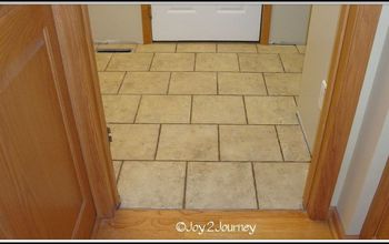 Newly tiled Mudroom Floor and attached bathroom ....