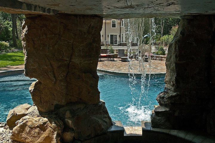 some of our best projects are a result of a referral from some one who did not use us, concrete masonry, outdoor living, pool designs, spas, View of the pool from inside the spa grotto