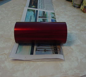 create newspaper pots, crafts, repurposing upcycling, roll your container i am using metal glass