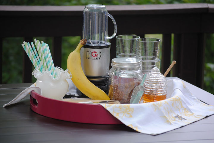 this summer s must have item a diy smoothie station, outdoor living, Everything looks so neat Glasses blender cutting board fruit it s all in one place