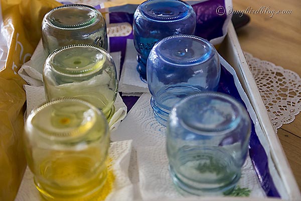 frascos de vidro coloridos arco ris