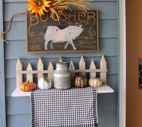 outdoor fall decor, outdoor living, patio, seasonal holiday decor, This is the side garage door with a picket fence shelf with Dollar Tree pumpkins and a galvanized container on a black and white checked runner Fun pig sign