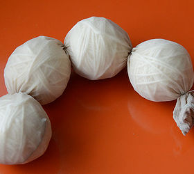 how to make dryer balls, crafts, Add several wool balls into an old panty hose leg Tie dental floss between wool balls