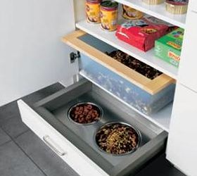 these kitchens have gone to the dogs, kitchen design, kitchen island, pets animals, Instead of toe kick on this cabinet a pull out drawer with food bowls was designed built Great use of space