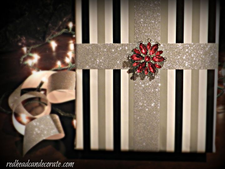 christmas gift wrapping ideas, christmas decorations, crafts, seasonal holiday decor, Chic stripes and a bright ornament make this gift special Two sided ribbon is another easy trick