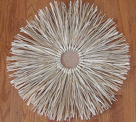 how to make a raffia centerpiece, crafts, home decor, seasonal holiday decor, wreaths, Have fun arranging any d cor accessories on top and around the raffia You can add a mirror and hang on the wall or use it as a door wreath Just let your imagination soar