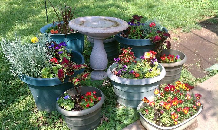 q how can i avoid spending a fortune on potting soil, container gardening, gardening, This is one of the areas in my yard with large and small pots I need economical way to fill old and new ones